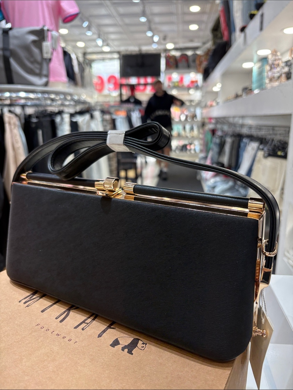 Classic Black Leatherette Shoulder Bag with Gold Accents